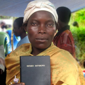 Sudanese woman holding a Bible