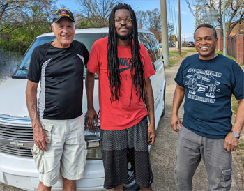 Victor, John, Lee, and car