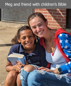 Meg and a child with children's Bible 