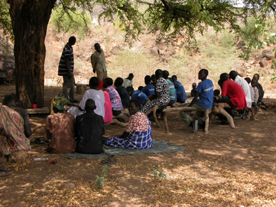 The first church service at Lalanga, Andrew preaching