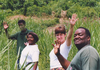 A Congolese guide, Bertha Lloyd, Leona Edler, Aaron Sims in Western Uganda, 1996